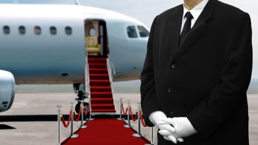 tapis rouge devant un jet privé